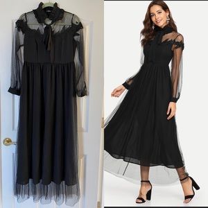 Beautiful black dress with lace sleeves; fits 8/10
